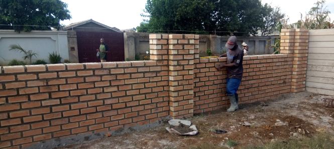 Brick Wall around house being layed